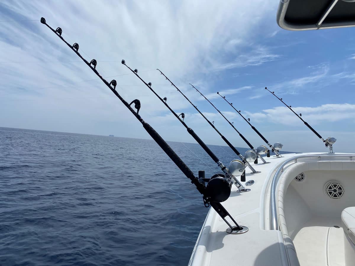 Winthrop Tackle Roller Guides shown on rods on fishing boat